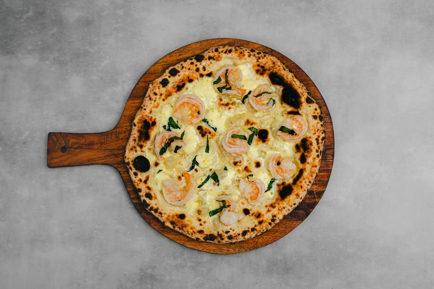 Garlic Prawn 
- Garlic Prawns, Fior Di Latte, Basil, Herb Oil (in Bianco) - surcharge of $2.00 per head applies 