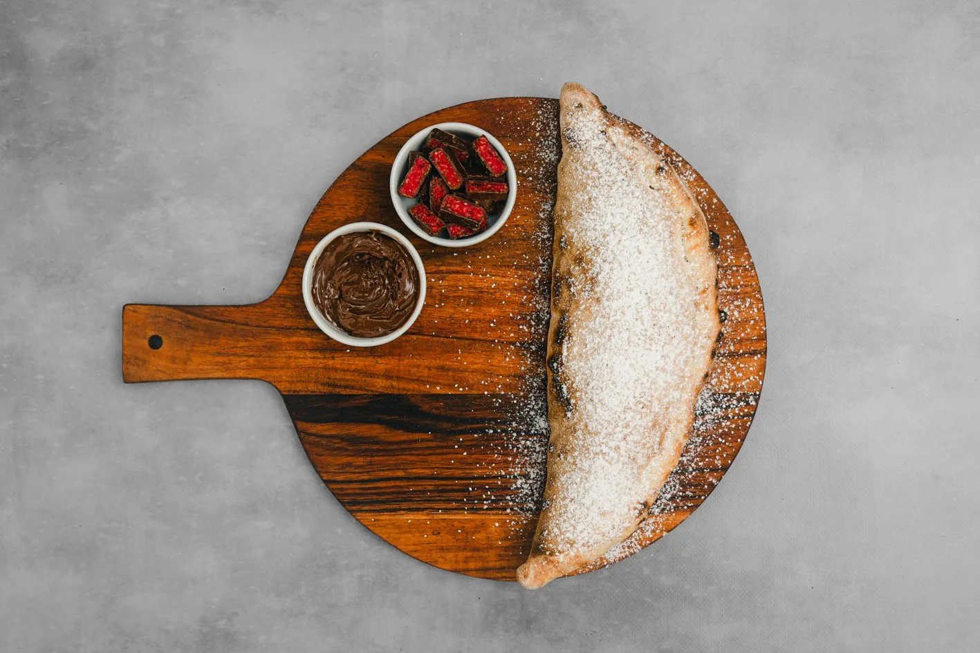 Cherry Ripe Calzone 
- Nutella, Cherry Ripe Chocolate, Icing Sugar 