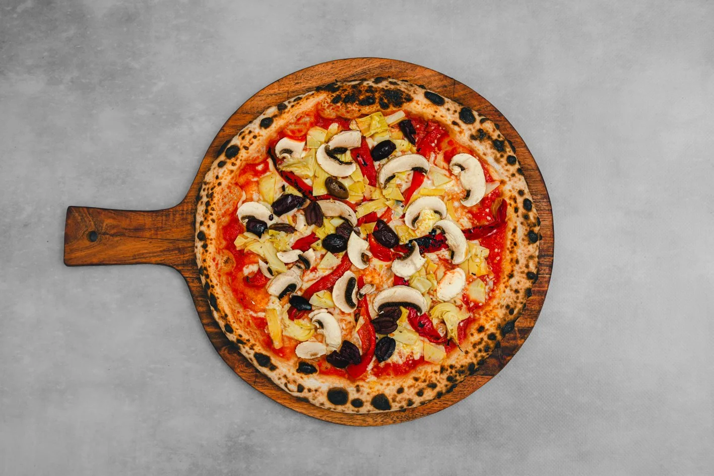 Vegan Delight 
- Vegan Sauce, Roast Capsicum, Artichoke, Mushroom, Olives - surcharge applies 