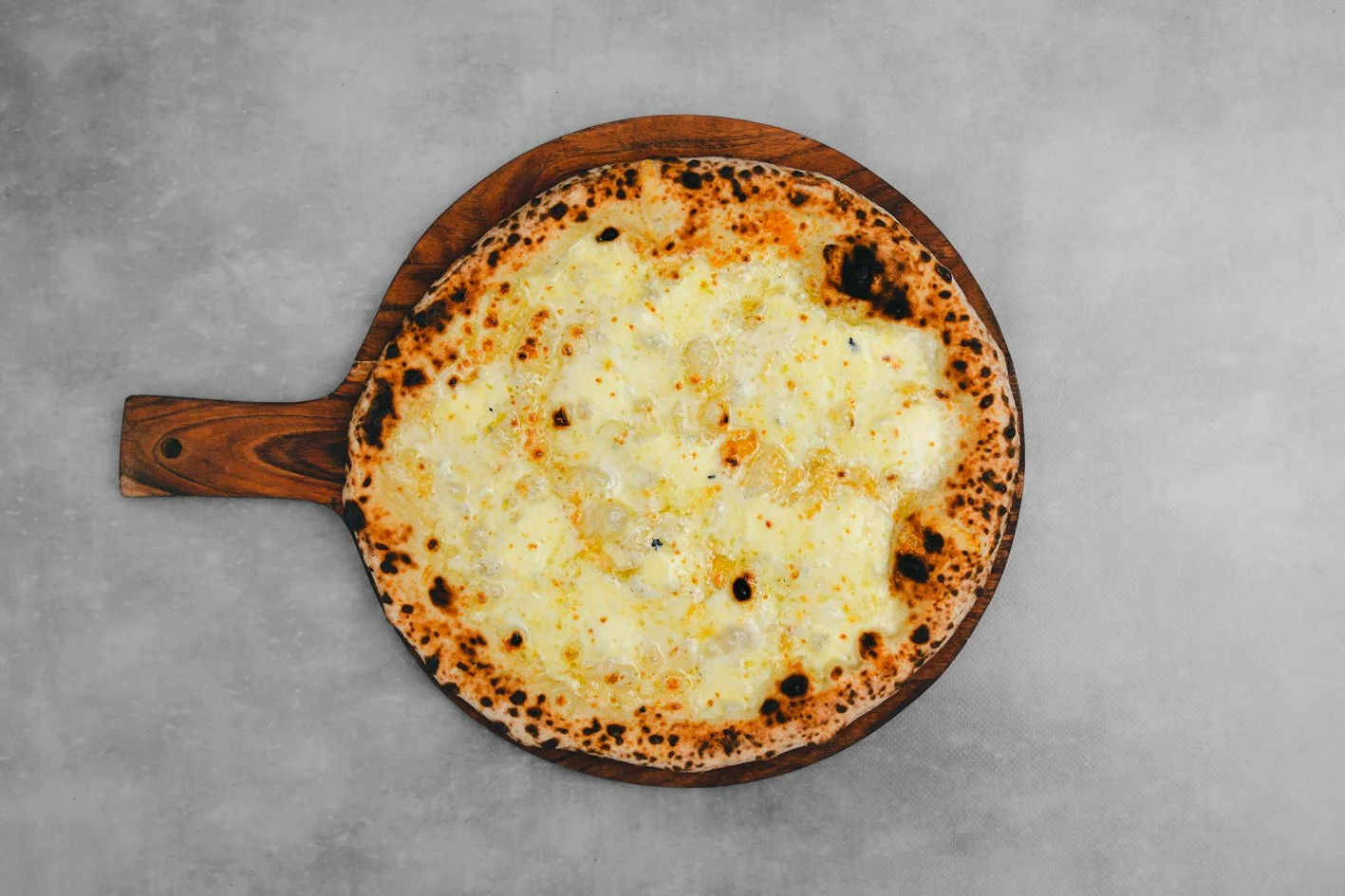 Quattro Formaggi 
- Fior Di Latte, Goats Cheese, Gorgonzola, Pecorino, Herb Oil (in Bianco / Oil Based) 