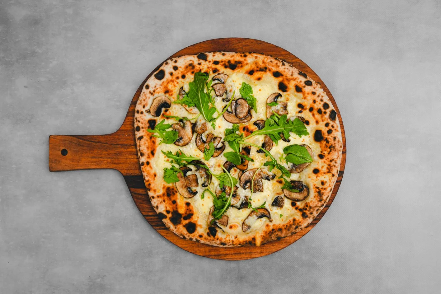 Mushroom 
- Herb Oil, Fior Di Latte, Swiss Brown Mushrooms, Goats Cheese, Rocket 