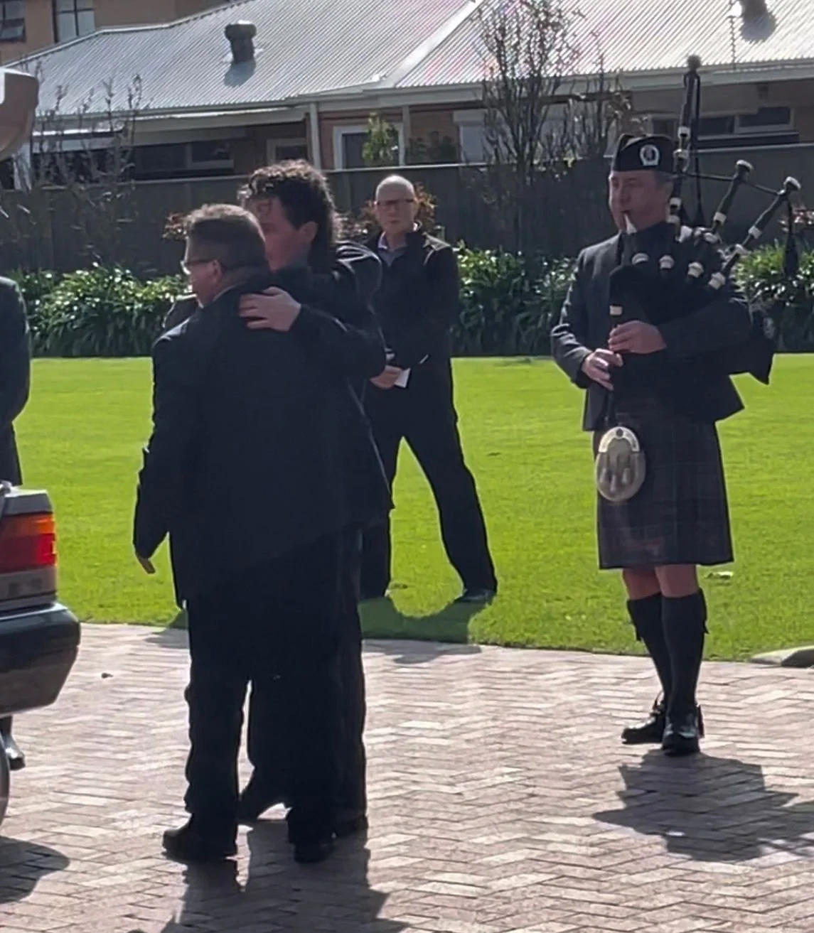 Adelaide bagpiper playing Highland Cathedral at funeral in Glenelg