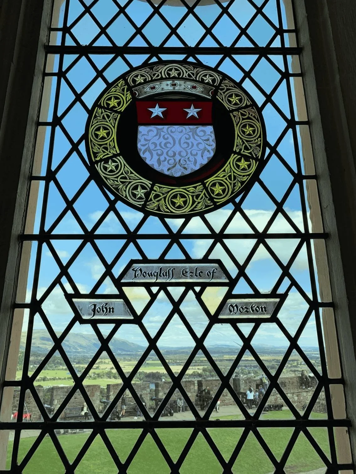 Adelaide bagpiper playing at funeral inside cathedral