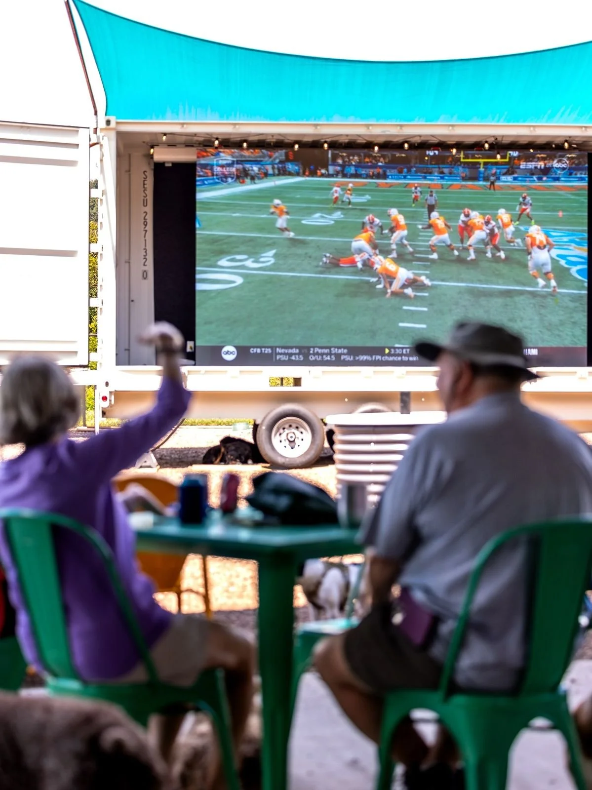 Outdoor Jumbotron video wall at Off Leash Social dog-friendly bar.  The massive LED video wall is the largest in east TN