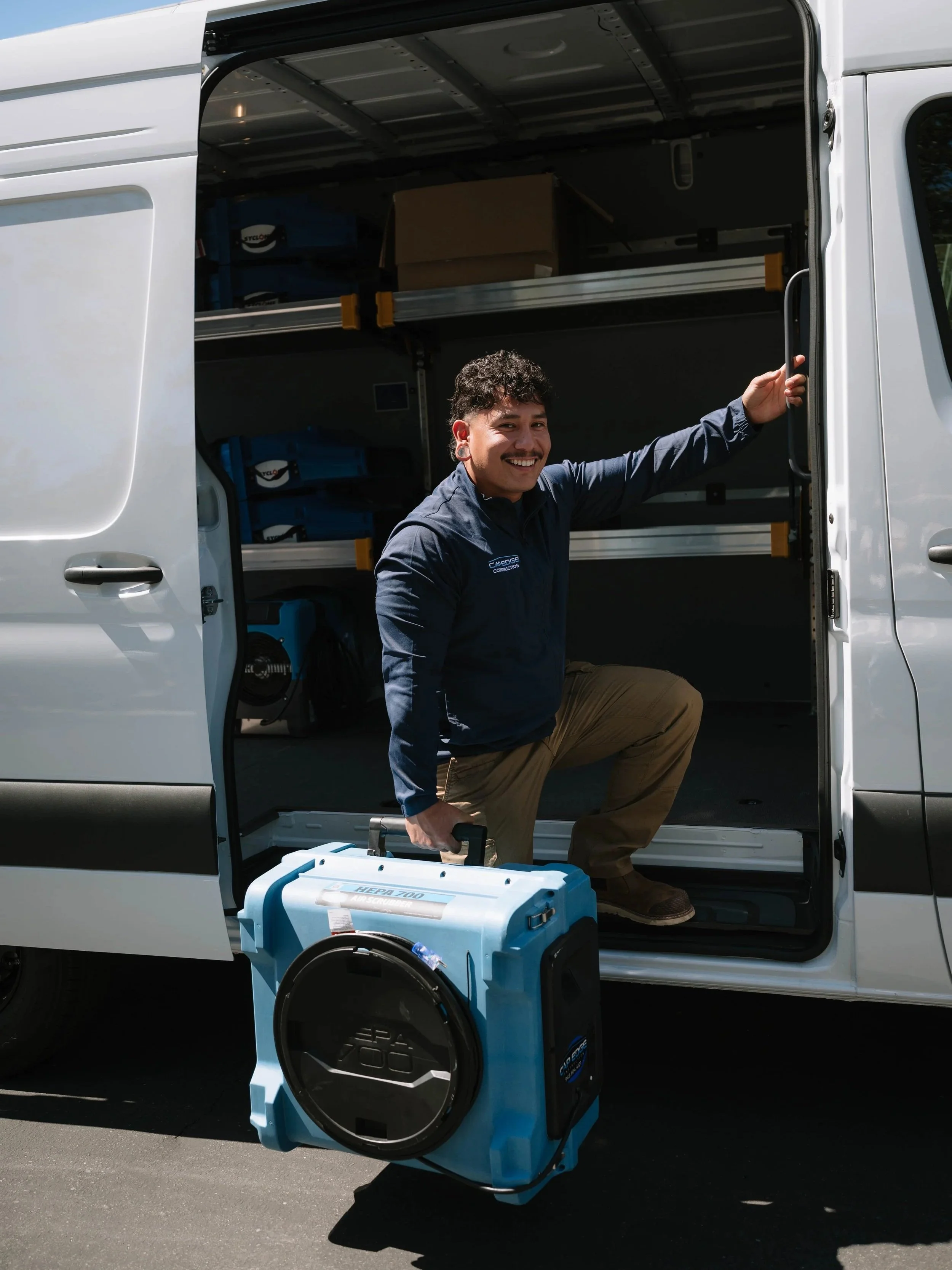 Water Mitigation Technician with Water Mitigation Tools responding to a water mitigation project.