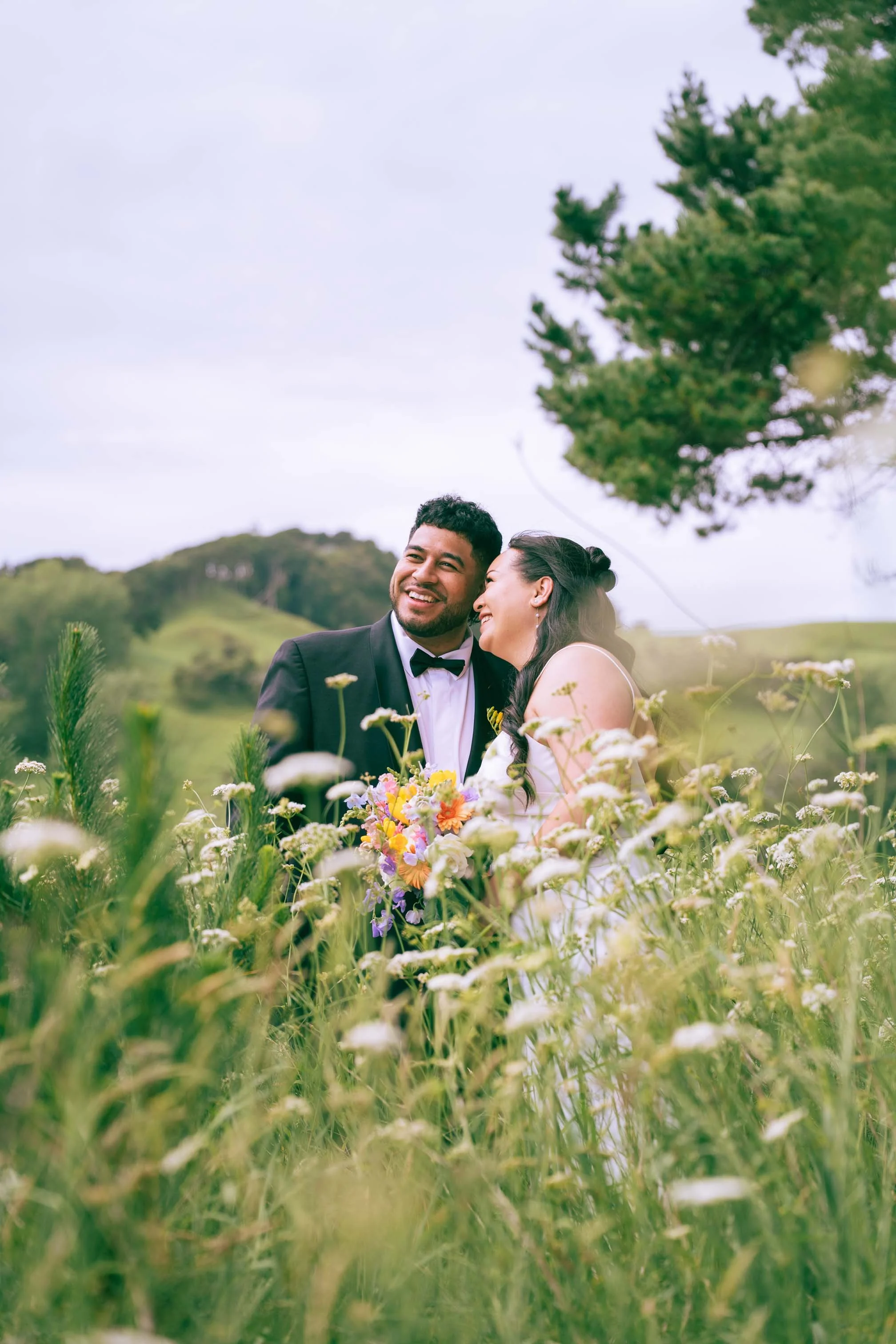 Natural, candid wedding couples photo. relaxed and laughing