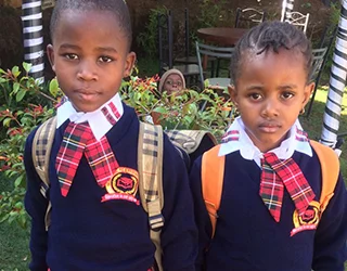 Children from Grace Orphanage in school uniform