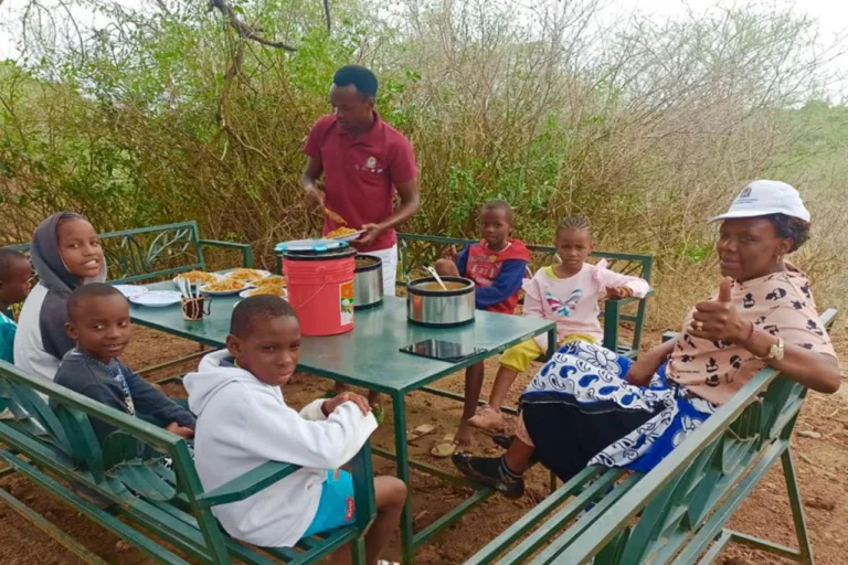 Children from Grace Orphanage enjoying a safari outing with caregivers