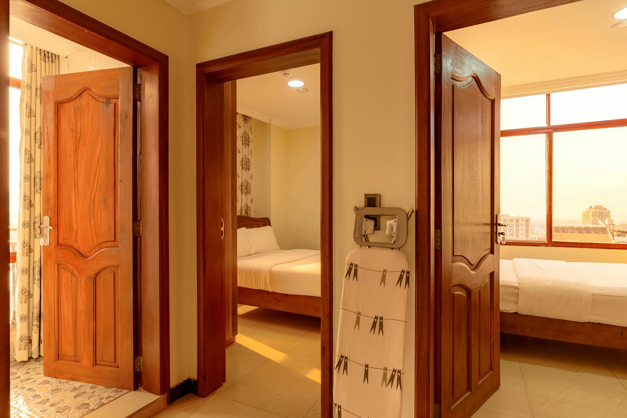 View of a bedroom inside a Kibo Palace Apartment in Arusha