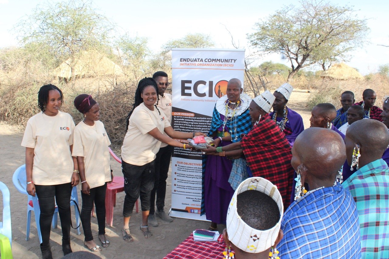 ECIO workers greeting members of the Maasai community in northern Tanzania