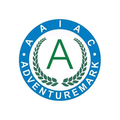 Logo of AA Adventure Mark featuring a blue circle with a green letter A inside, surrounded by a laurel wreath.
