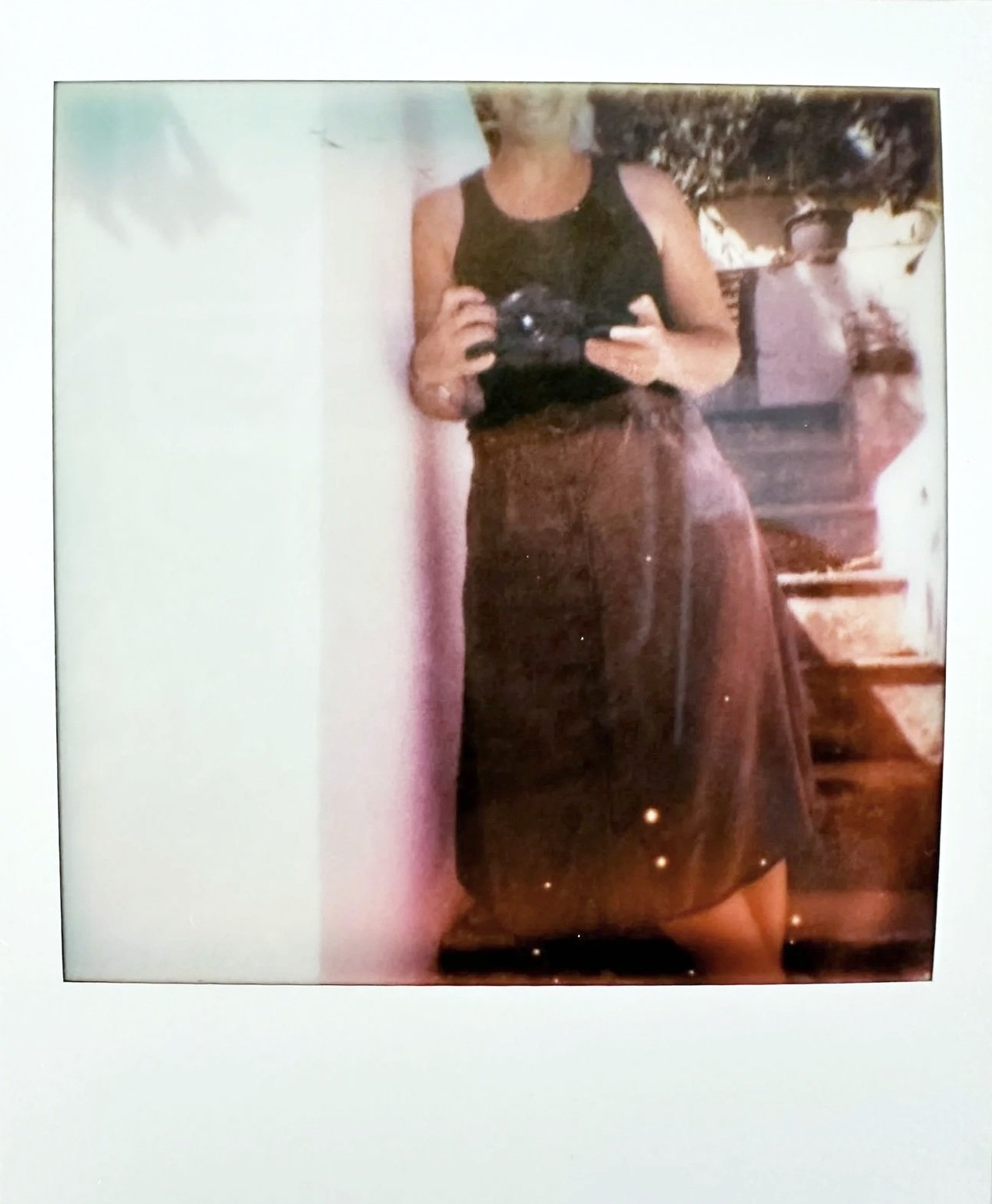polaroid de la photographe prise en photo par un enfant lors d'une seance famille