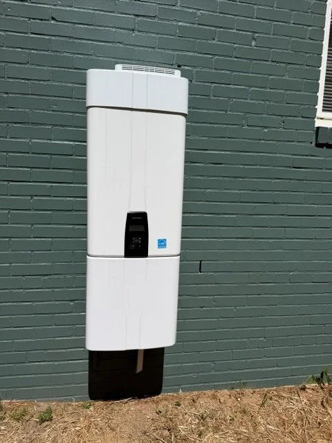 Outdoor installation of a Navien.