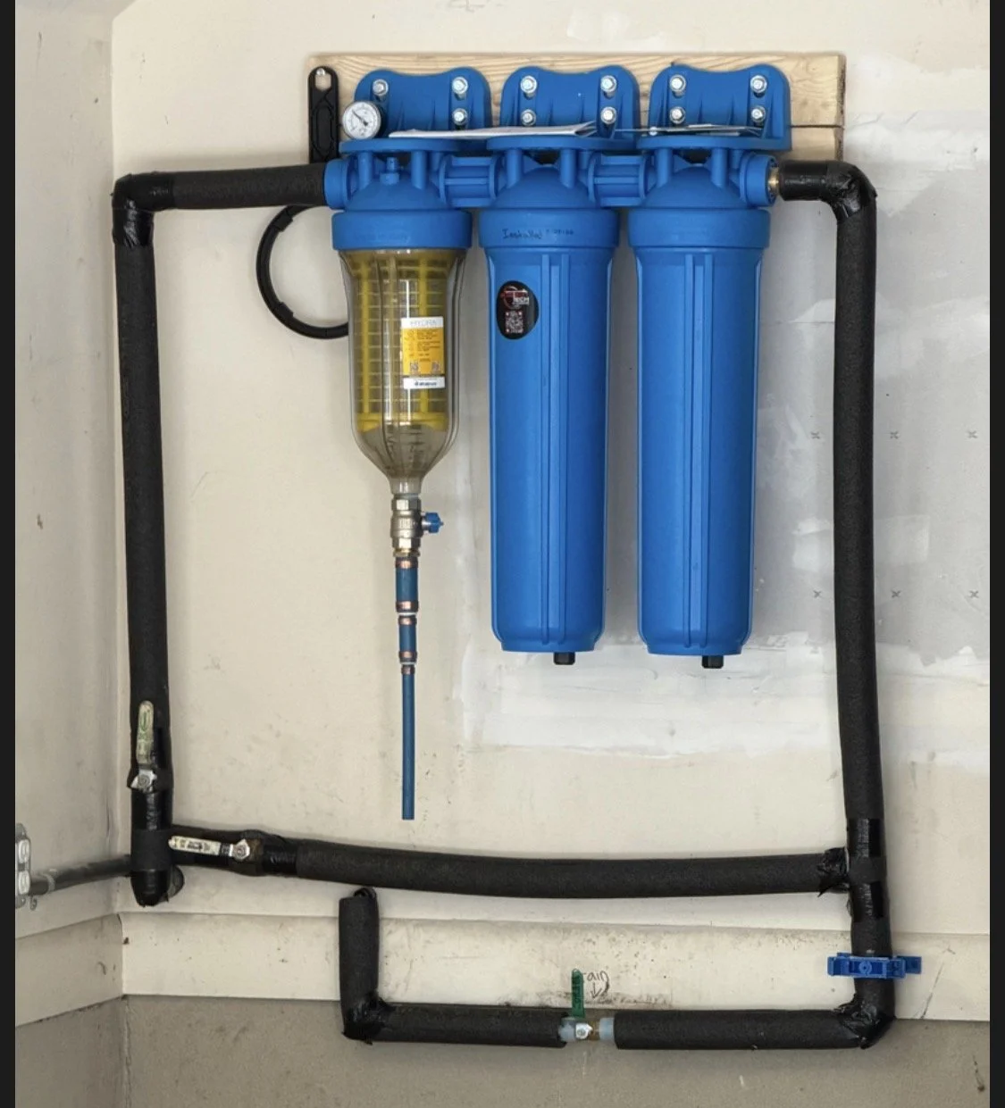 Fixing leak in wall and adding whole house 3 stage water filtration system.