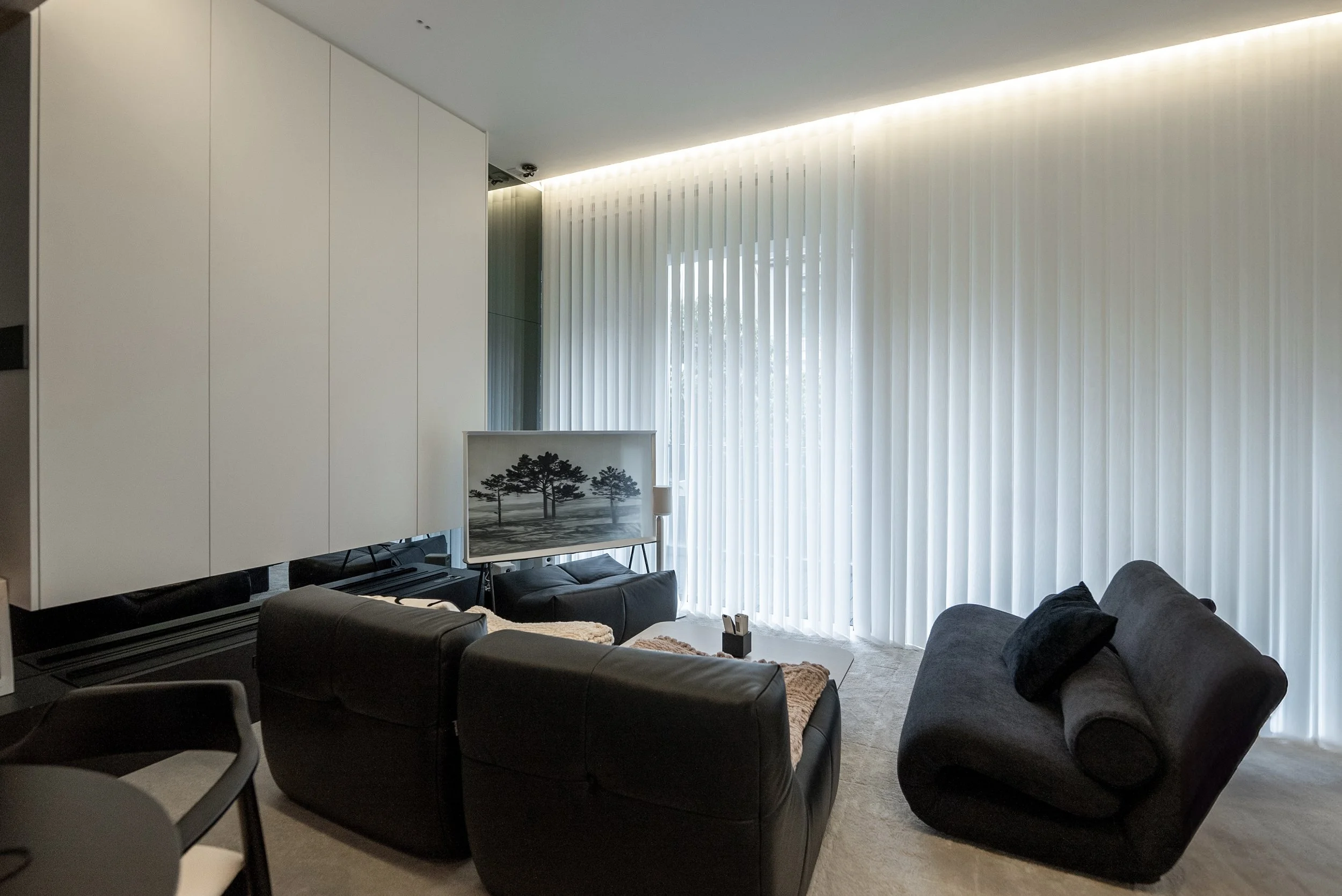 Full-height Ripple Blinds in a Singapore condominium living area, filtering natural light while providing privacy.