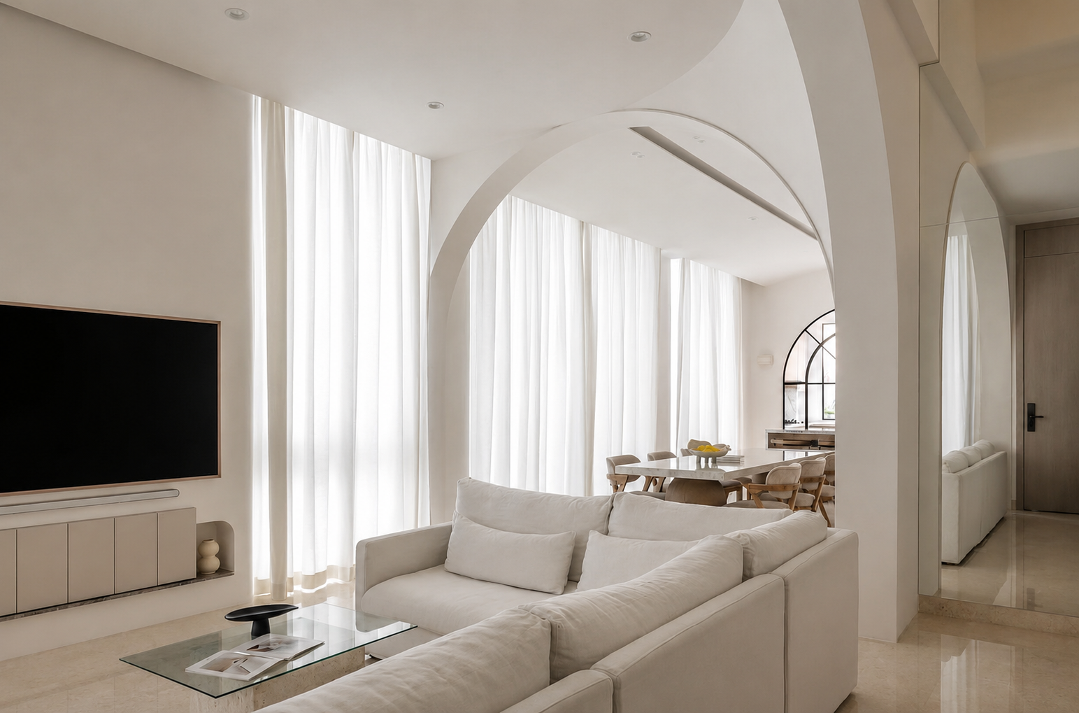 Full-height curtains in a modern Singapore living and dining area, softly filtering natural light and complementing the home’s arched architectural details.