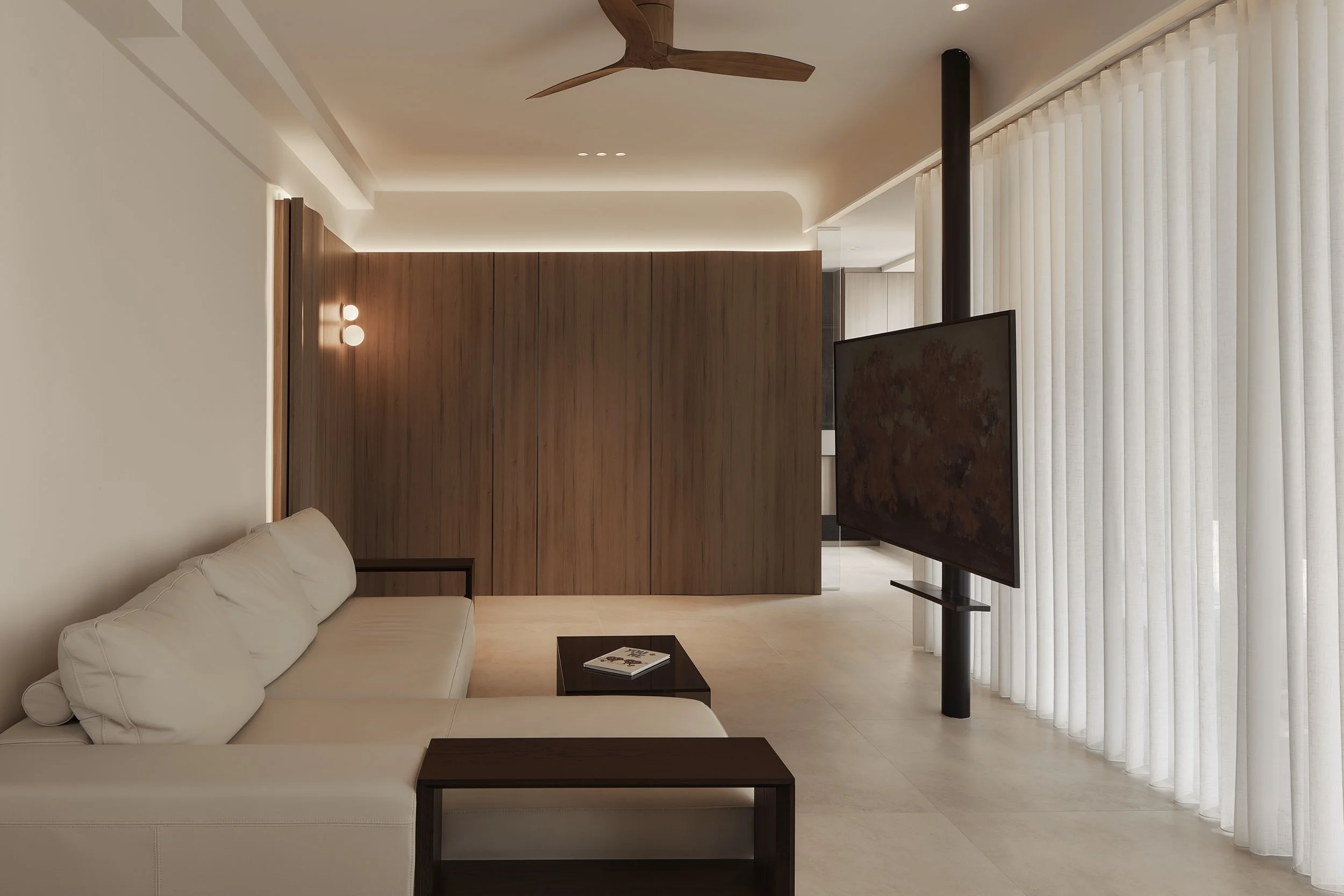 Lucent™ sheer curtains installed in a modern living room in Singapore