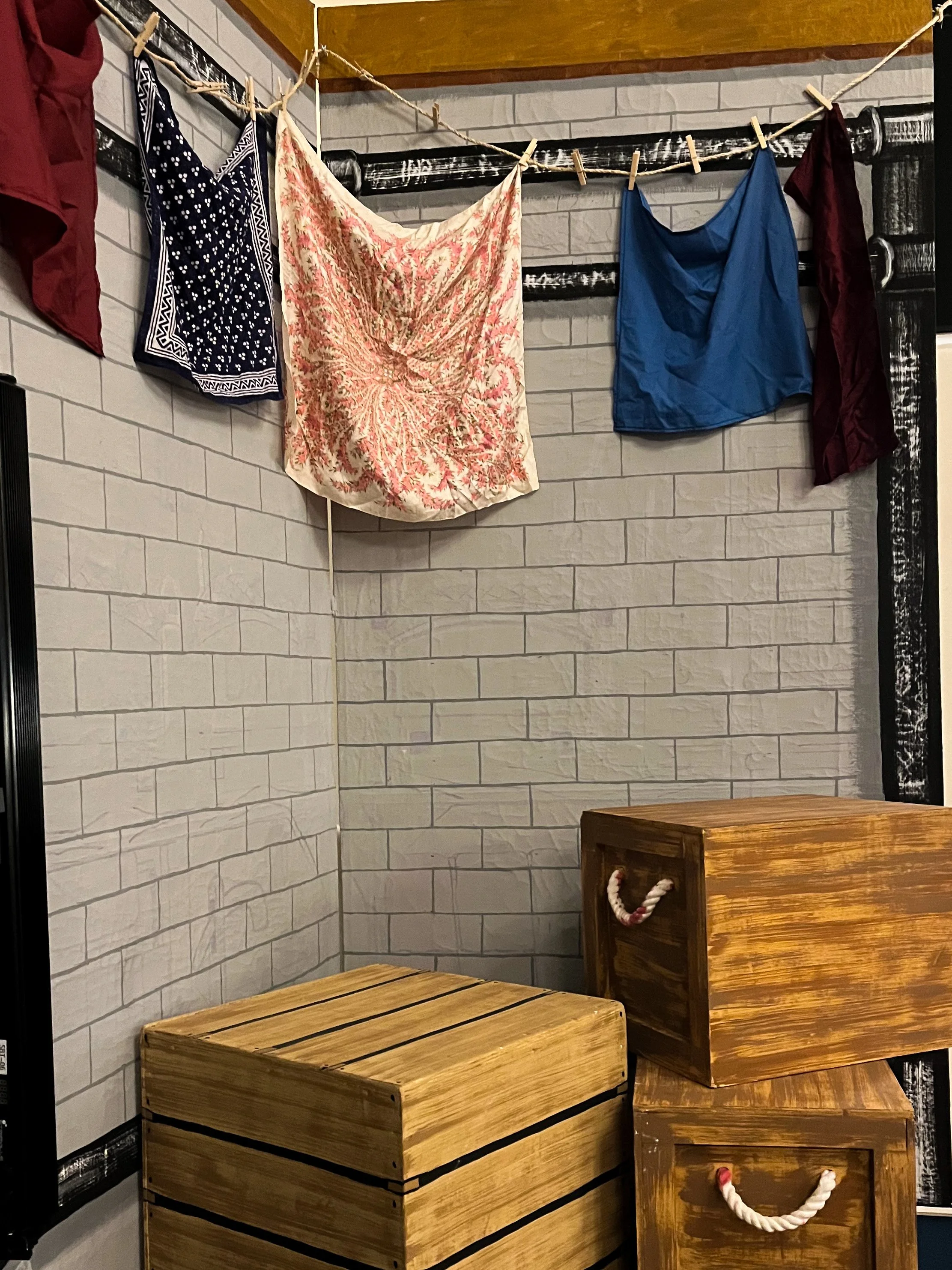 Part of the set for Fagin's Den in Oliver! Axminster 2024