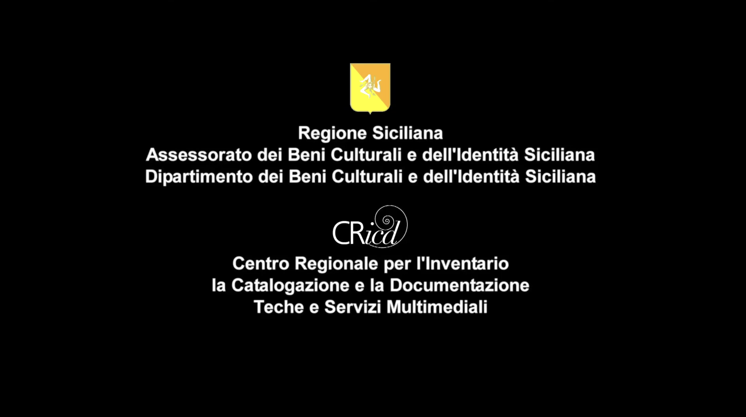 Schermo nero con testo bianco e logo centrale, riguarda la Regione Siciliana e il Centro Regionale per l'Inventario e la Catalogazione dei Beni Culturali, con riferimenti al Dipartimento dei Beni Culturali e dell'Identità Siciliana.