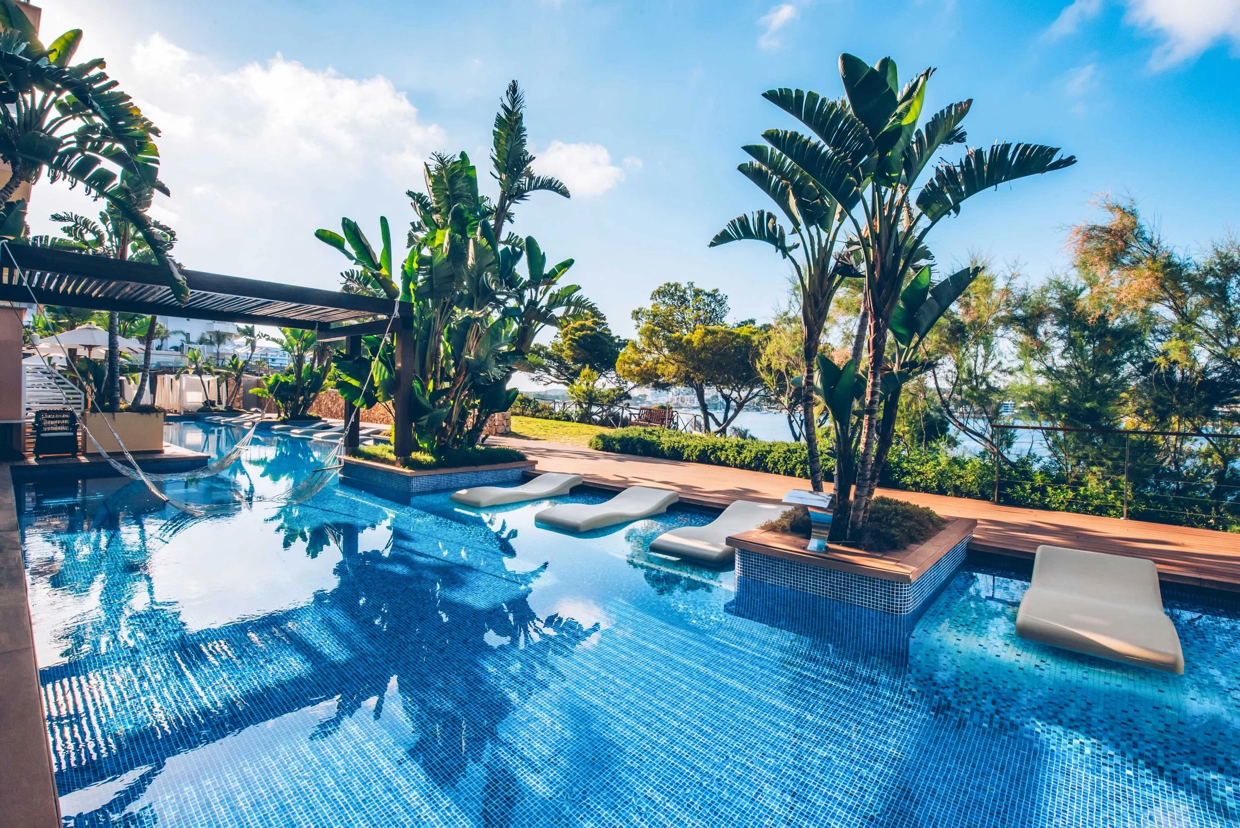 Palm-fringed pool terrace at the adults-only Iberostar Selection Jardín del Sol Suites, Mallorca