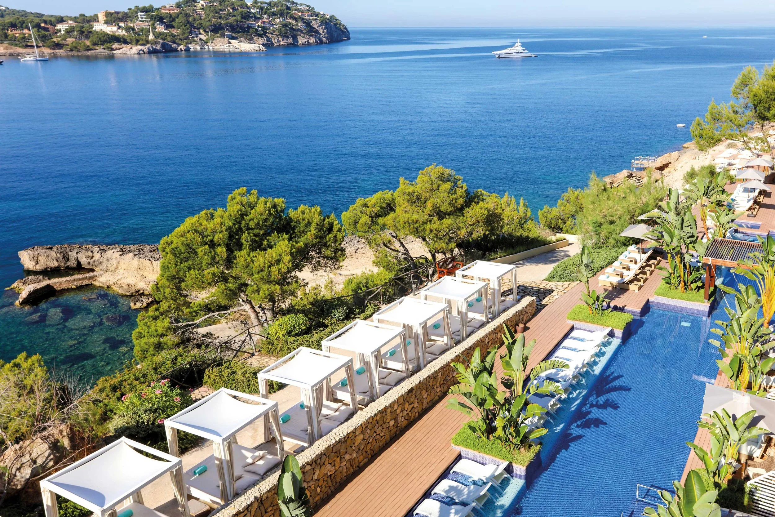 Aerial view of the Iberostar Selection Jardín del Sol Suites and its pools above Santa Ponsa Bay, Mallorca