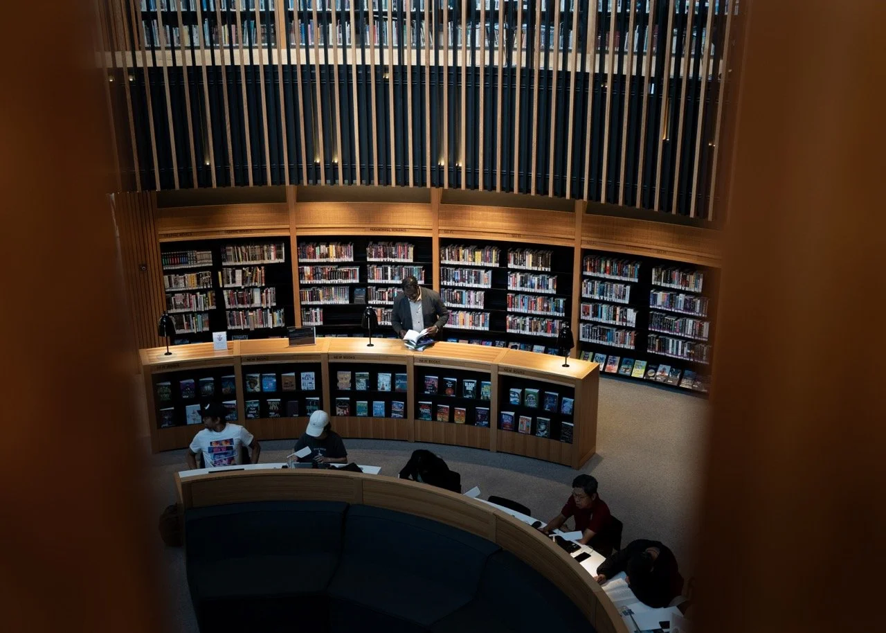 People studying on a library.
