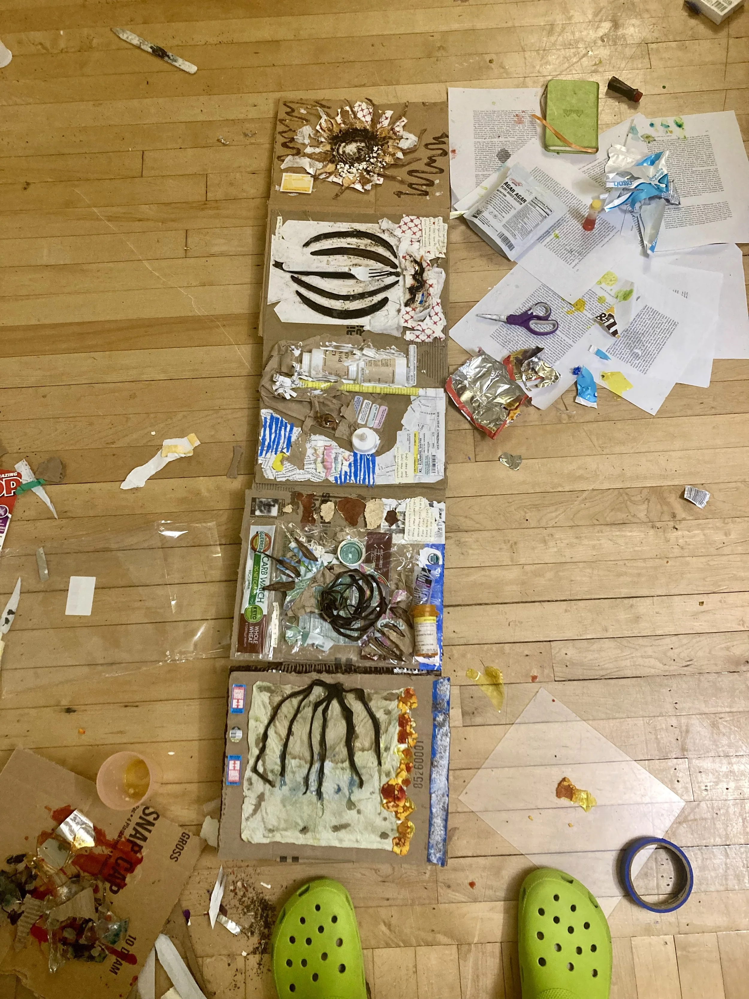 assembling an accordion book of my waste scraps from June 2025 for my senior thesis.