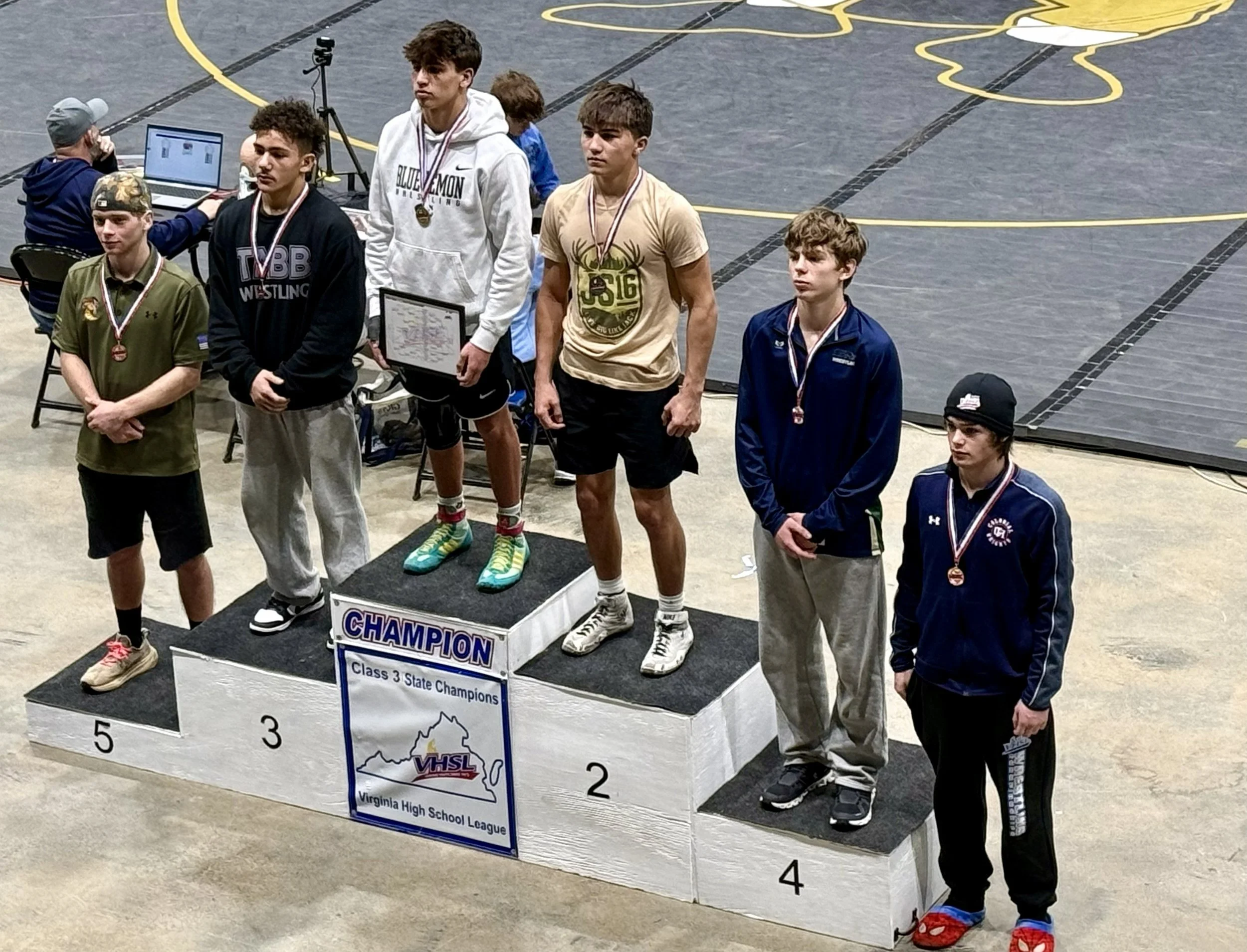 February 21, 2025-Leland LIVING BIG on the podium for wrestling state championship!