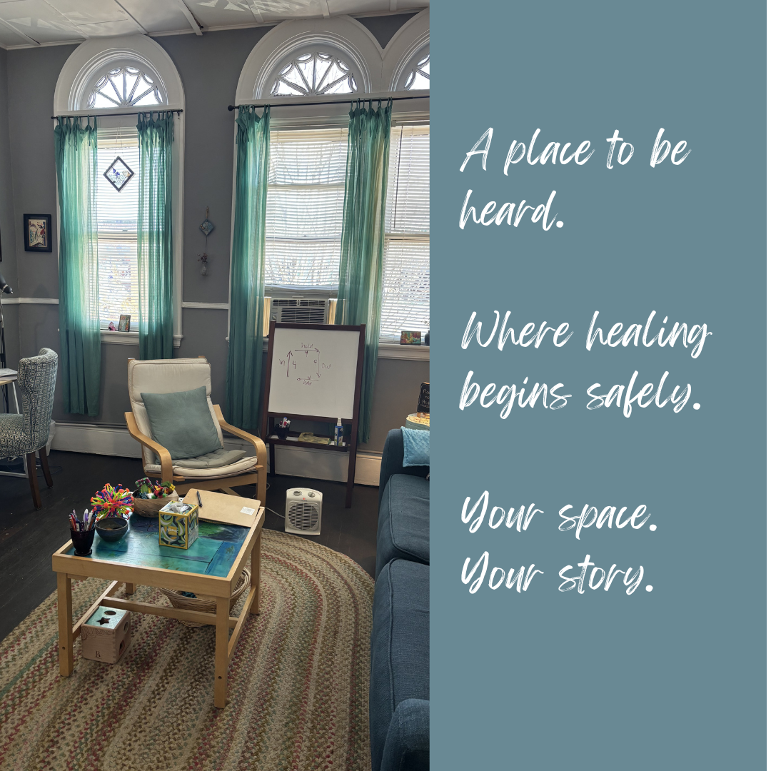 Cozy therapy or counseling room with comfortable chairs, a small table with art supplies, a whiteboard, and decorative curtains, promoting healing and a safe environment.