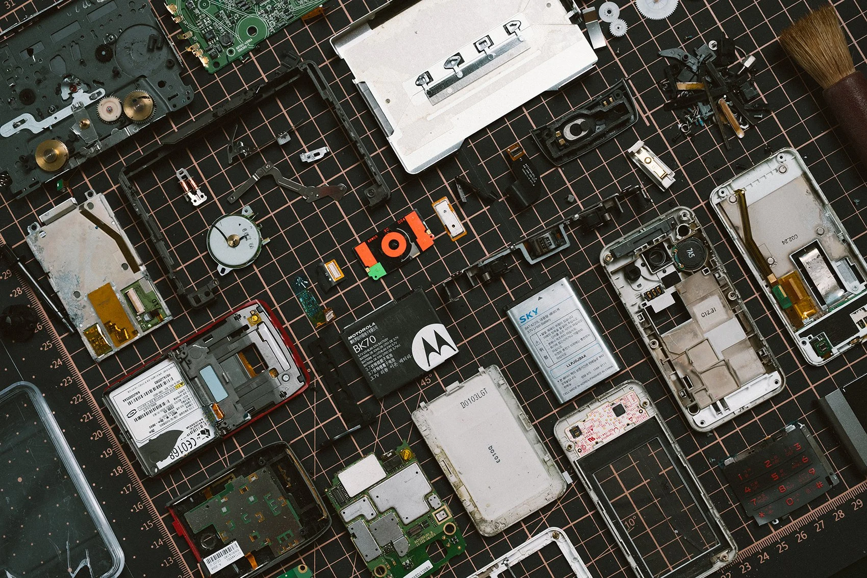 Upcycled robot sculpture made from e-waste and vintage camera parts by fori sim