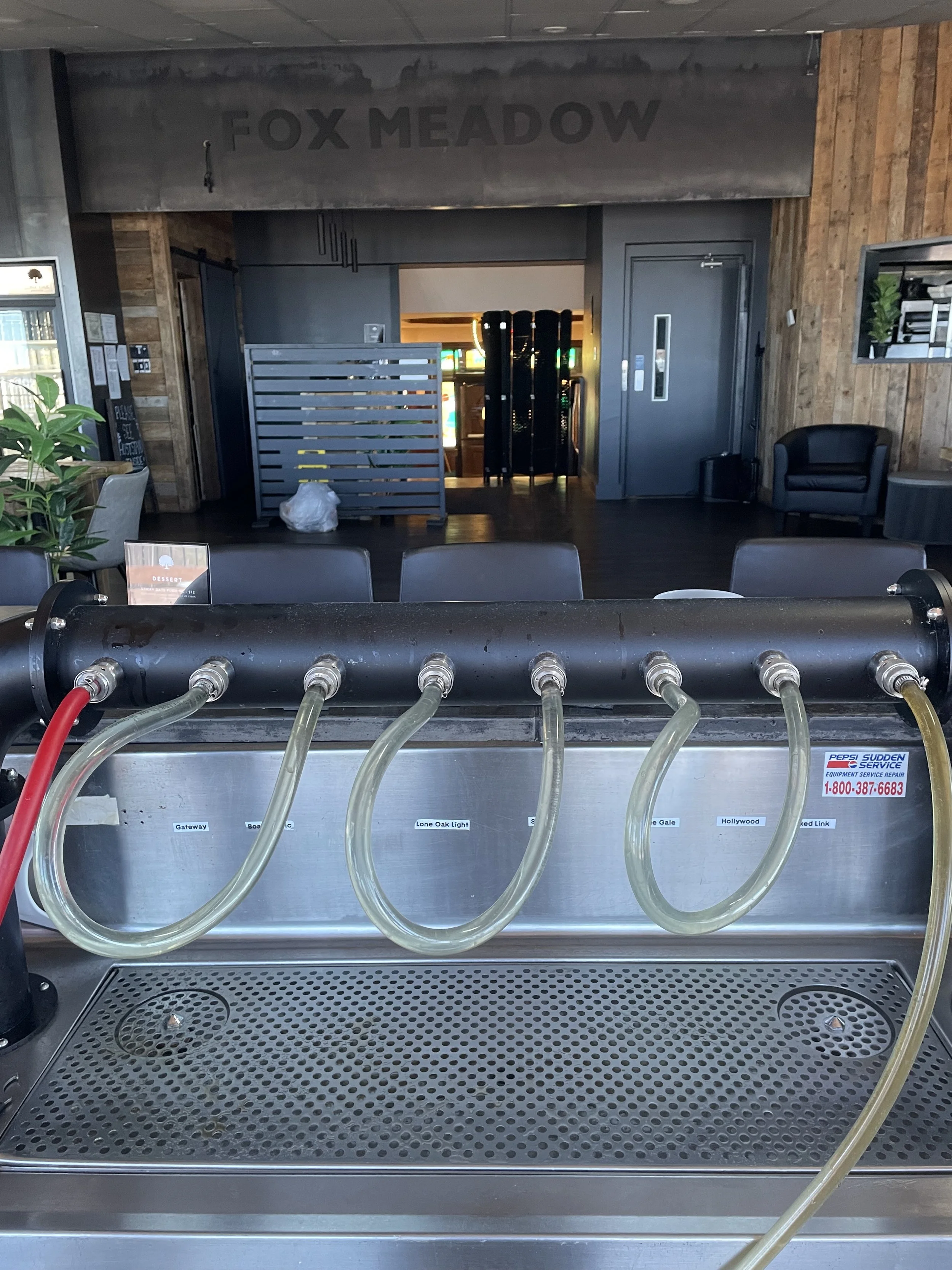 Technician performing draught line cleaning service