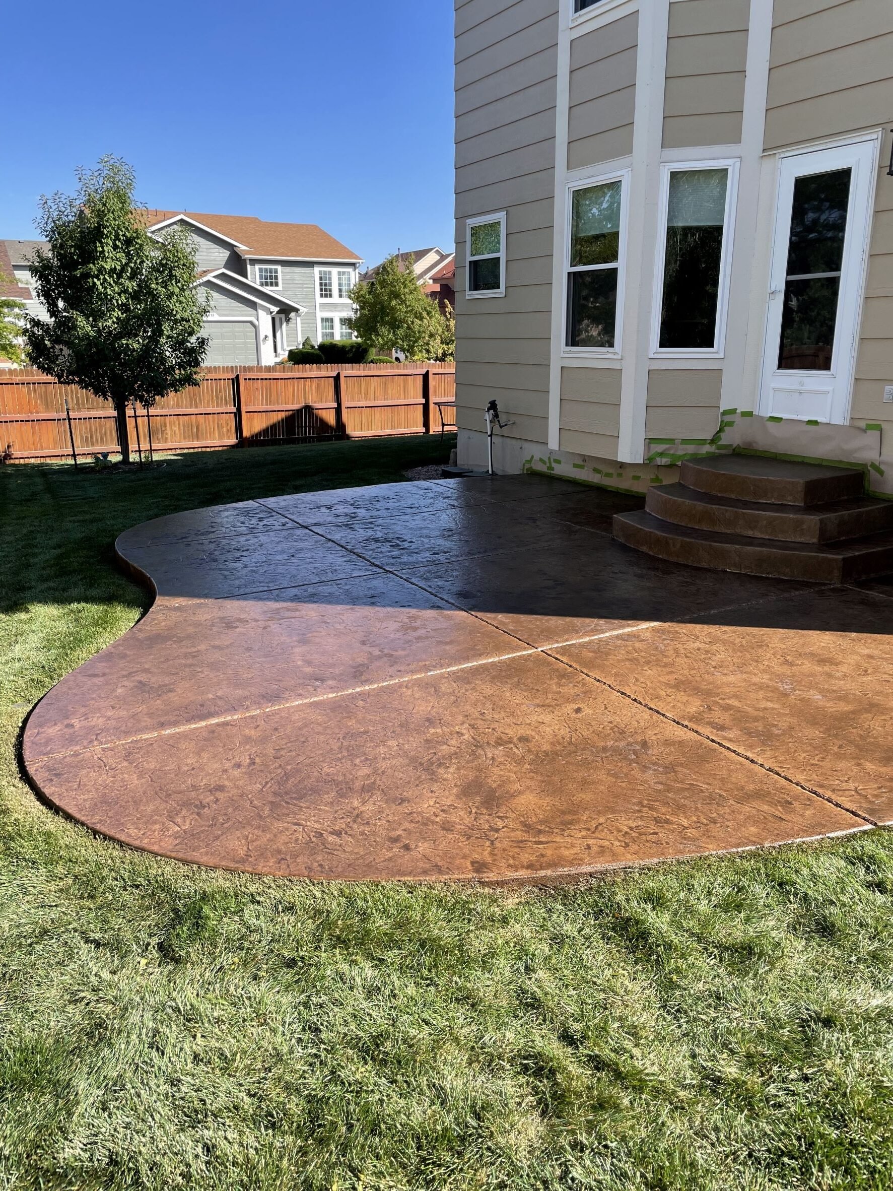 Brown-Stained-Stamped-Concrete-Patio-Driftwood-Antiquing-Stain-rotated.jpeg