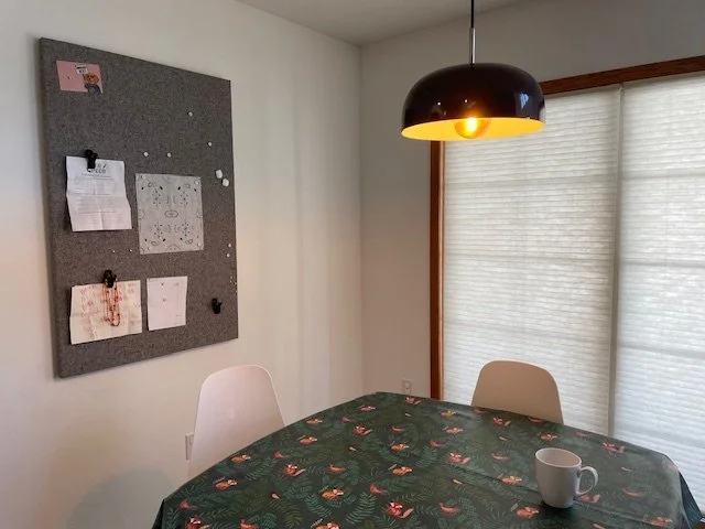 Dining room with bulletin board