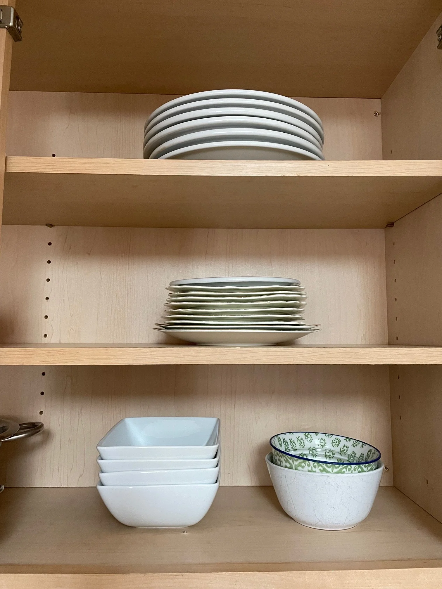 Kitchen shelves with plates and bowls