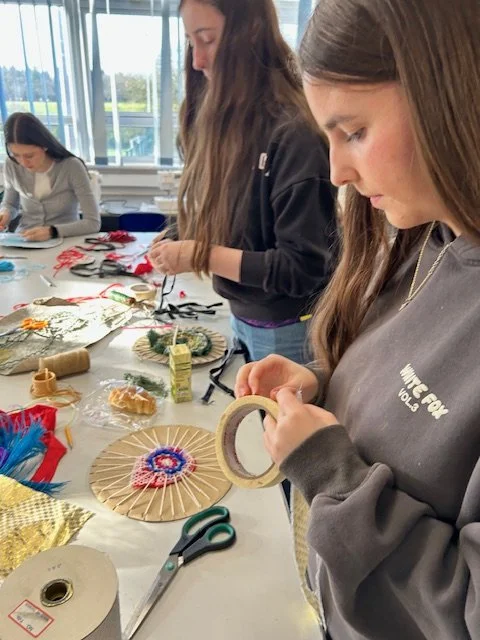 Making and exploring with a variety of textures and fabrics, allowing participants to create and express themselves freely.