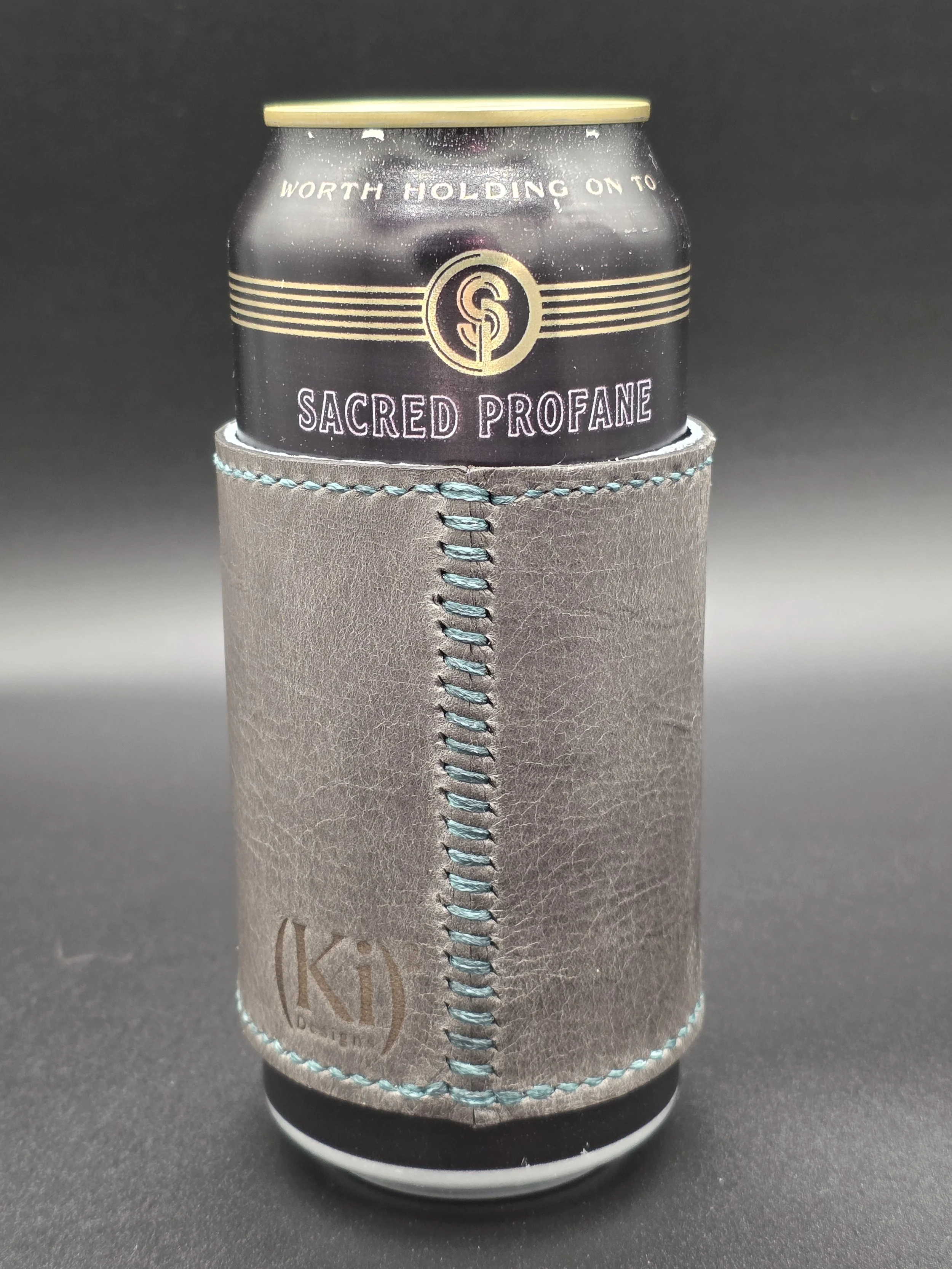 gray-brown stan can teal back.jpg
