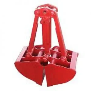 Roter mechanischer Erdgreifer (Zweischalengreifer) zur Miete für den effizienten Umschlag, Aushub und Transport von Erdreich, Sand oder Schotter in Kombination mit einem Kran auf Baustellen.