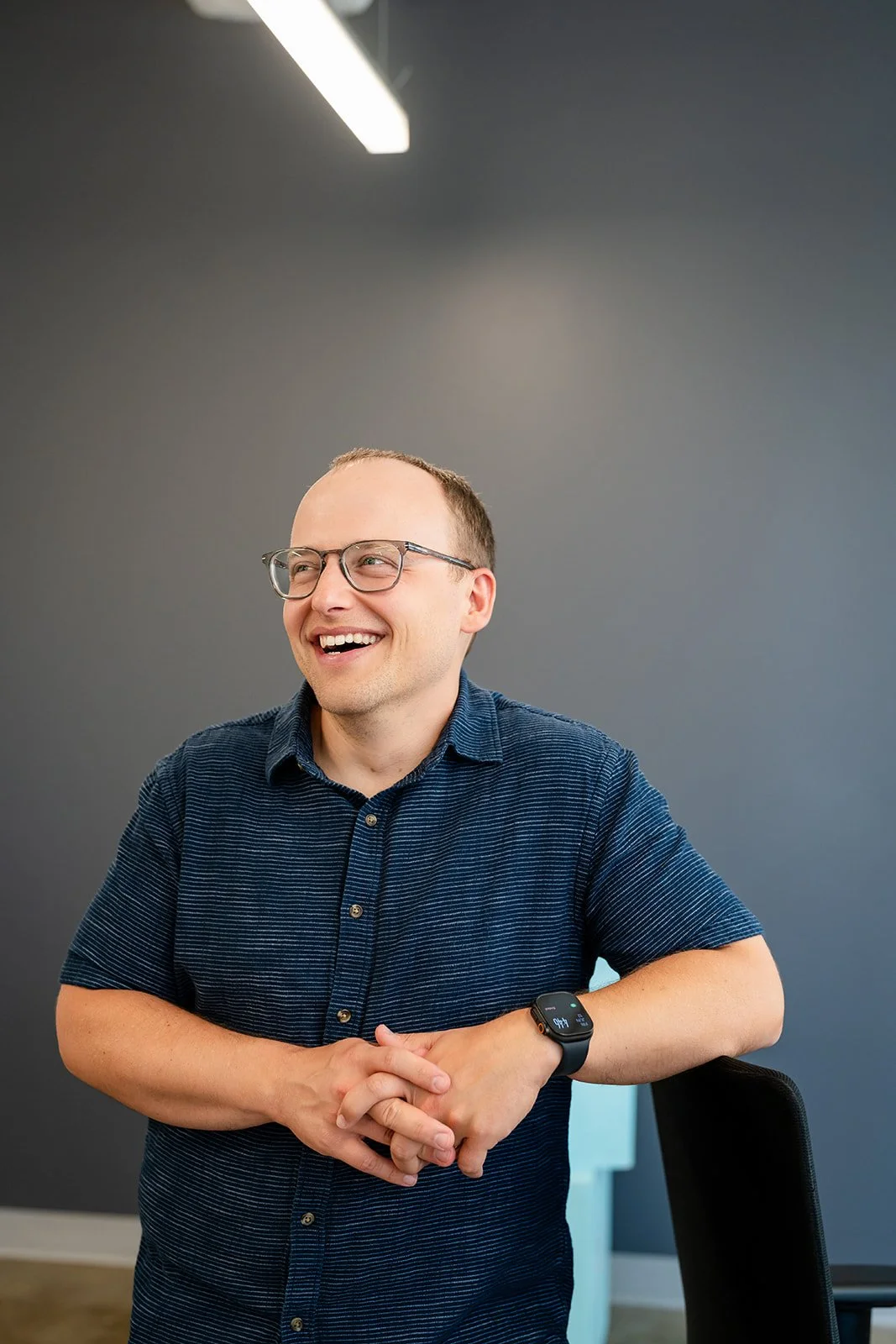 Russ McBride, founder of McBride, smiling in a headshot.
