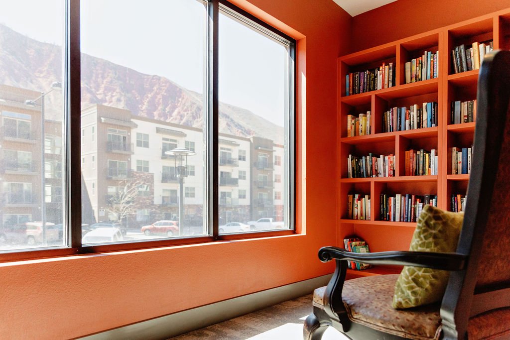 Book nook with shelves and chairs