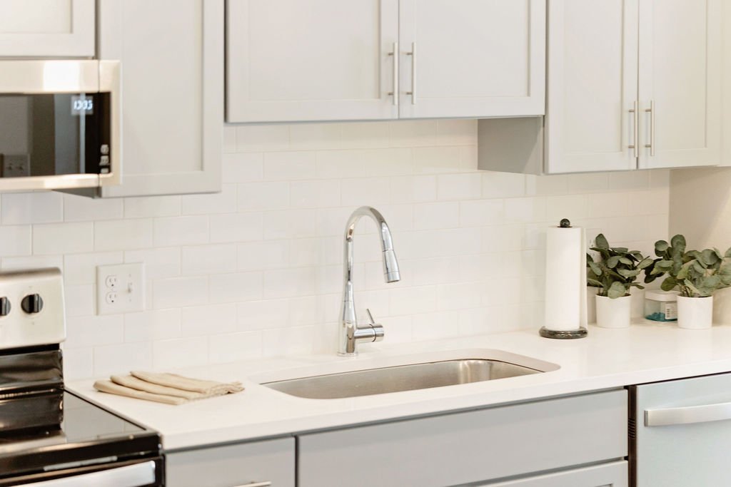 Sink in kitchen of condo