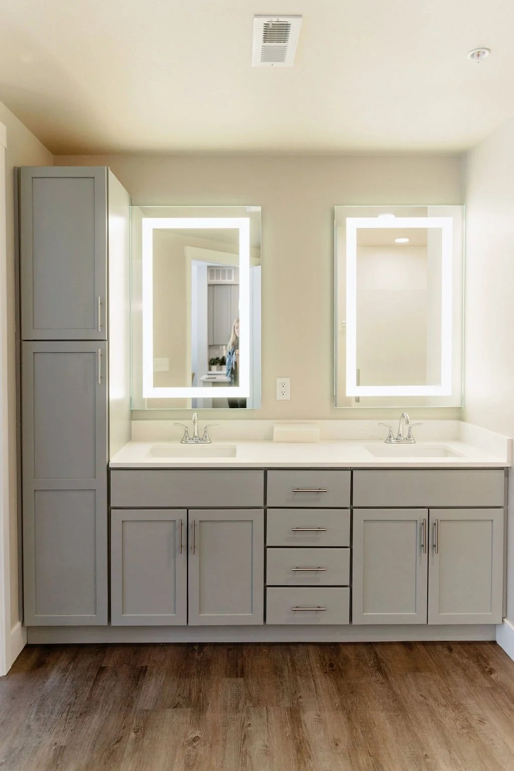 Double vanity in one bedroom condo.