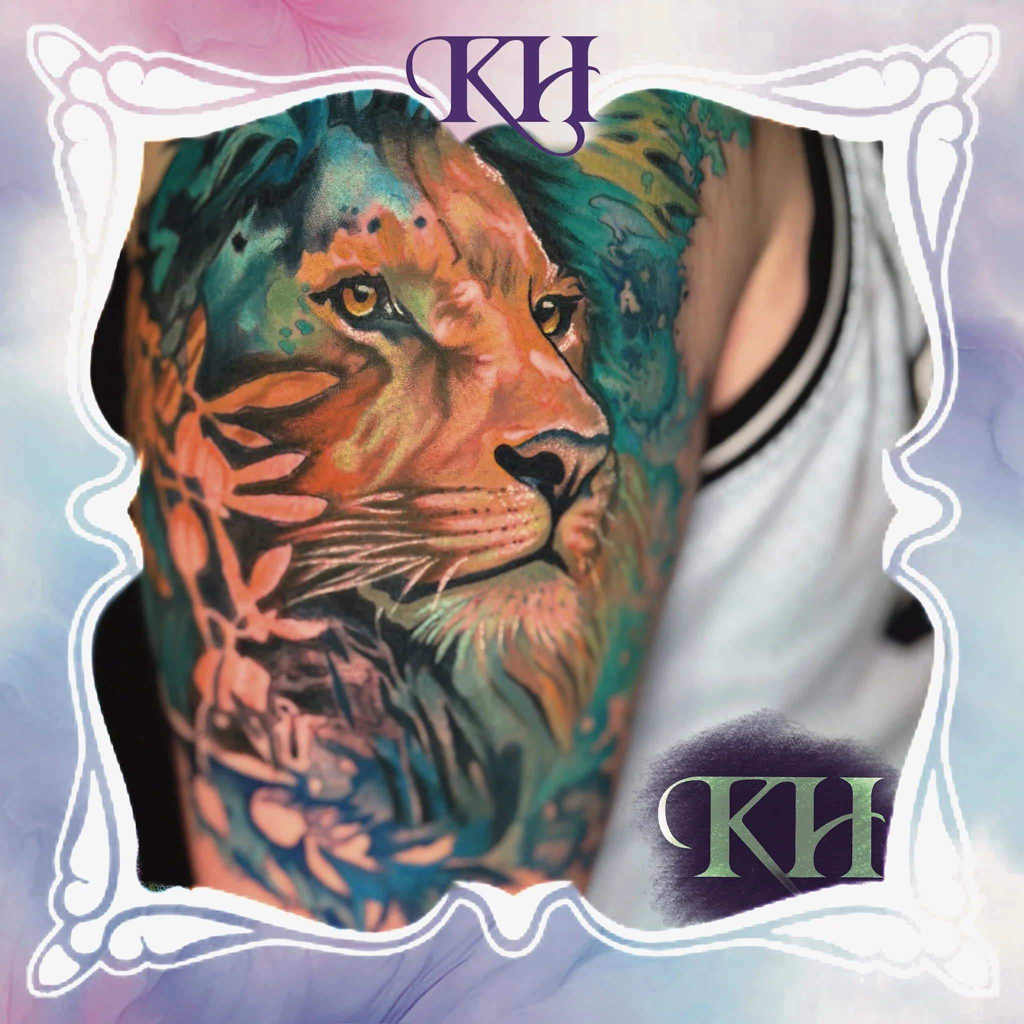 Colorful tattoo of a lion's face on someone's upper arm, with vibrant shades of orange, green, and blue, and the initials 'KH' at the top and bottom of the image.