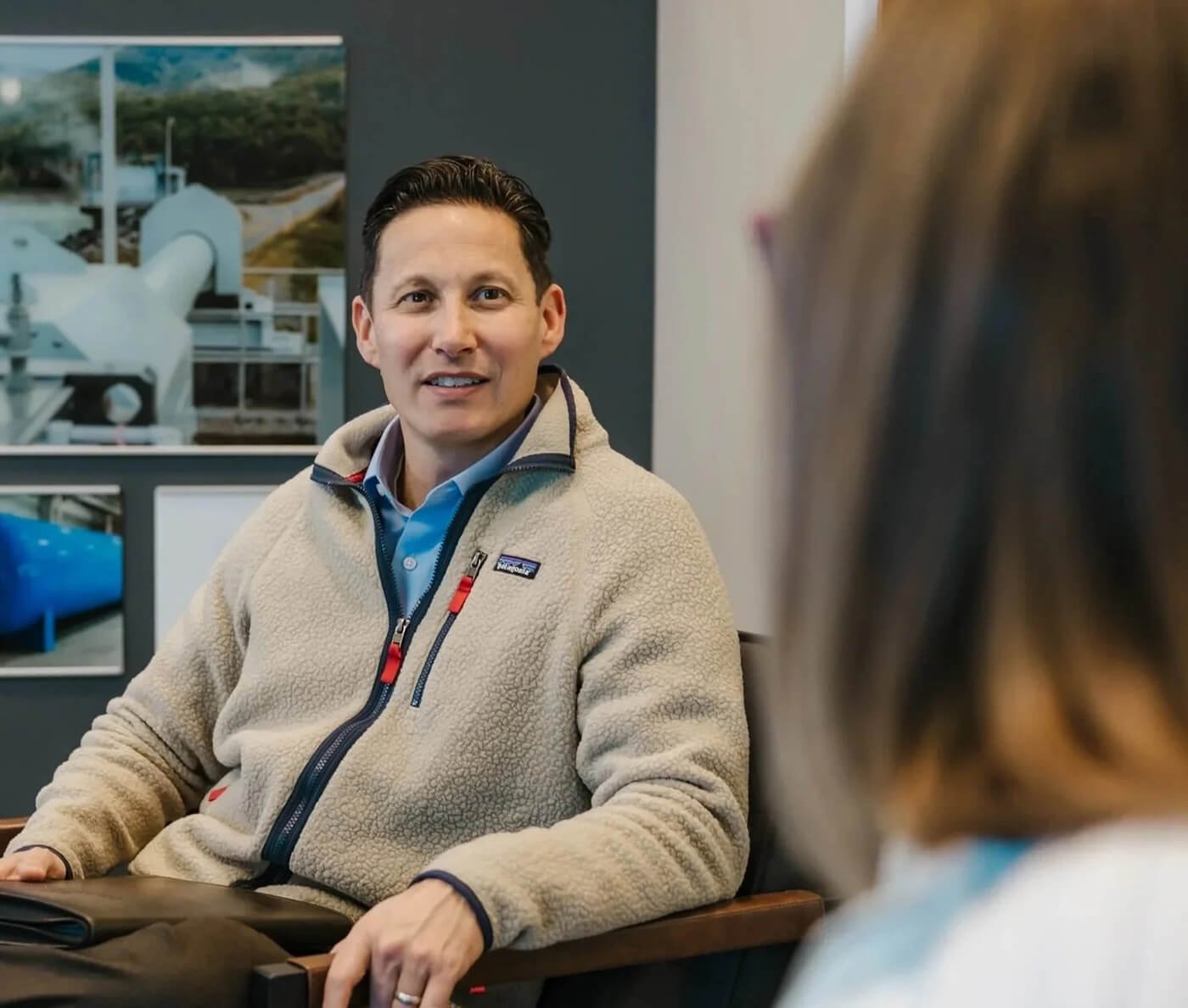 One-on-one meeting at Wisconsin River Partners with an investor discussing business opportunities.