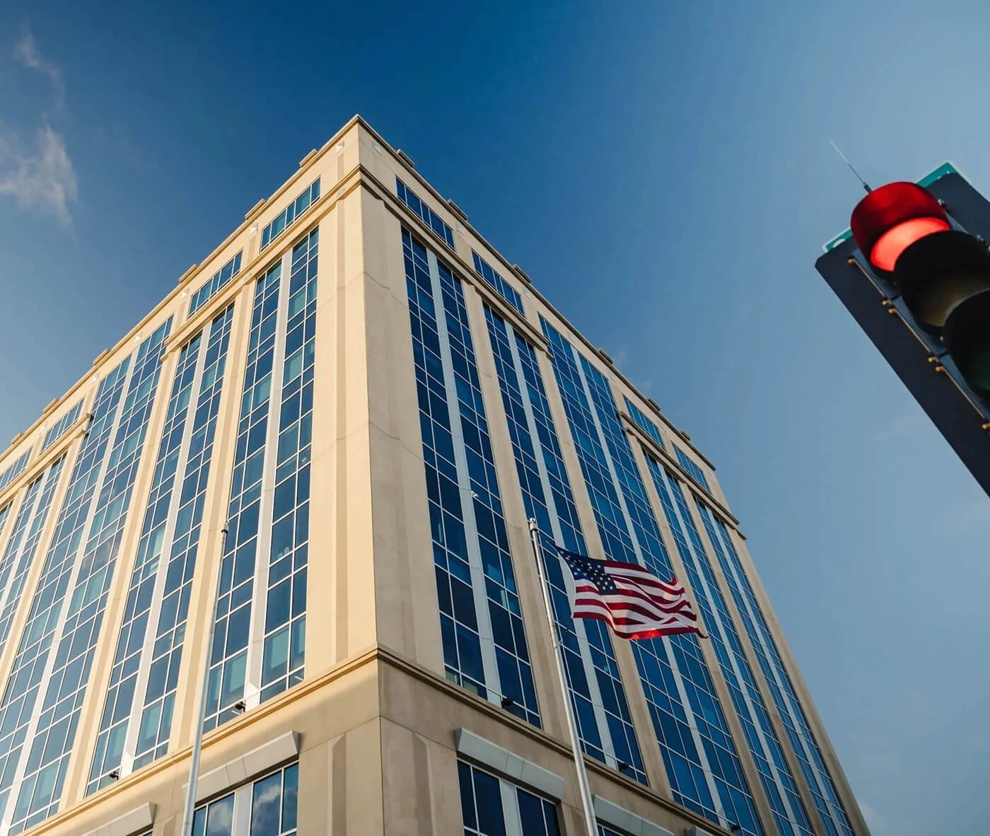 Dudley Tower office building in Wausau, Wisconsin with an American flag, home to Wisconsin River Partners.