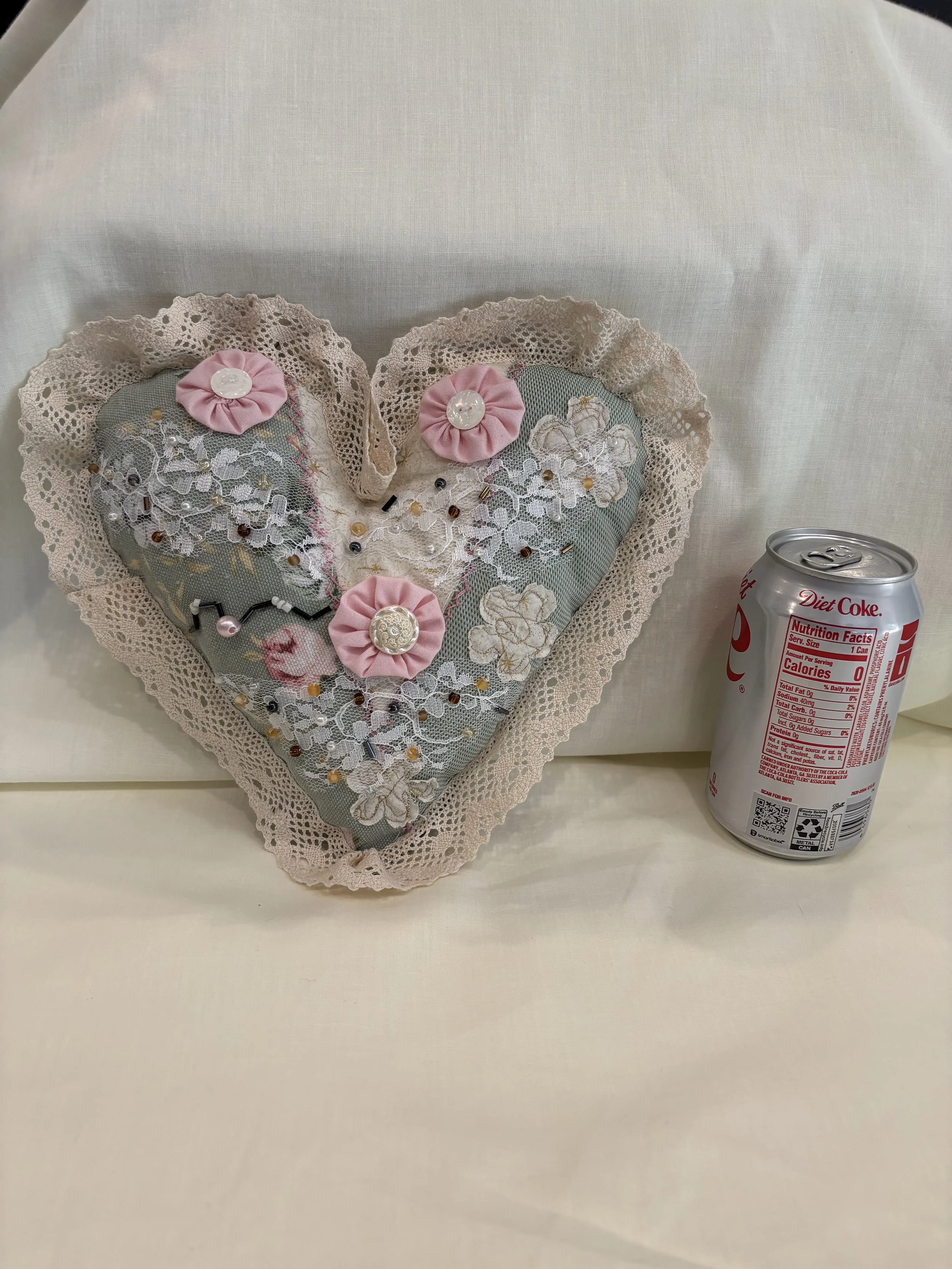 Hand embellished heart pillow