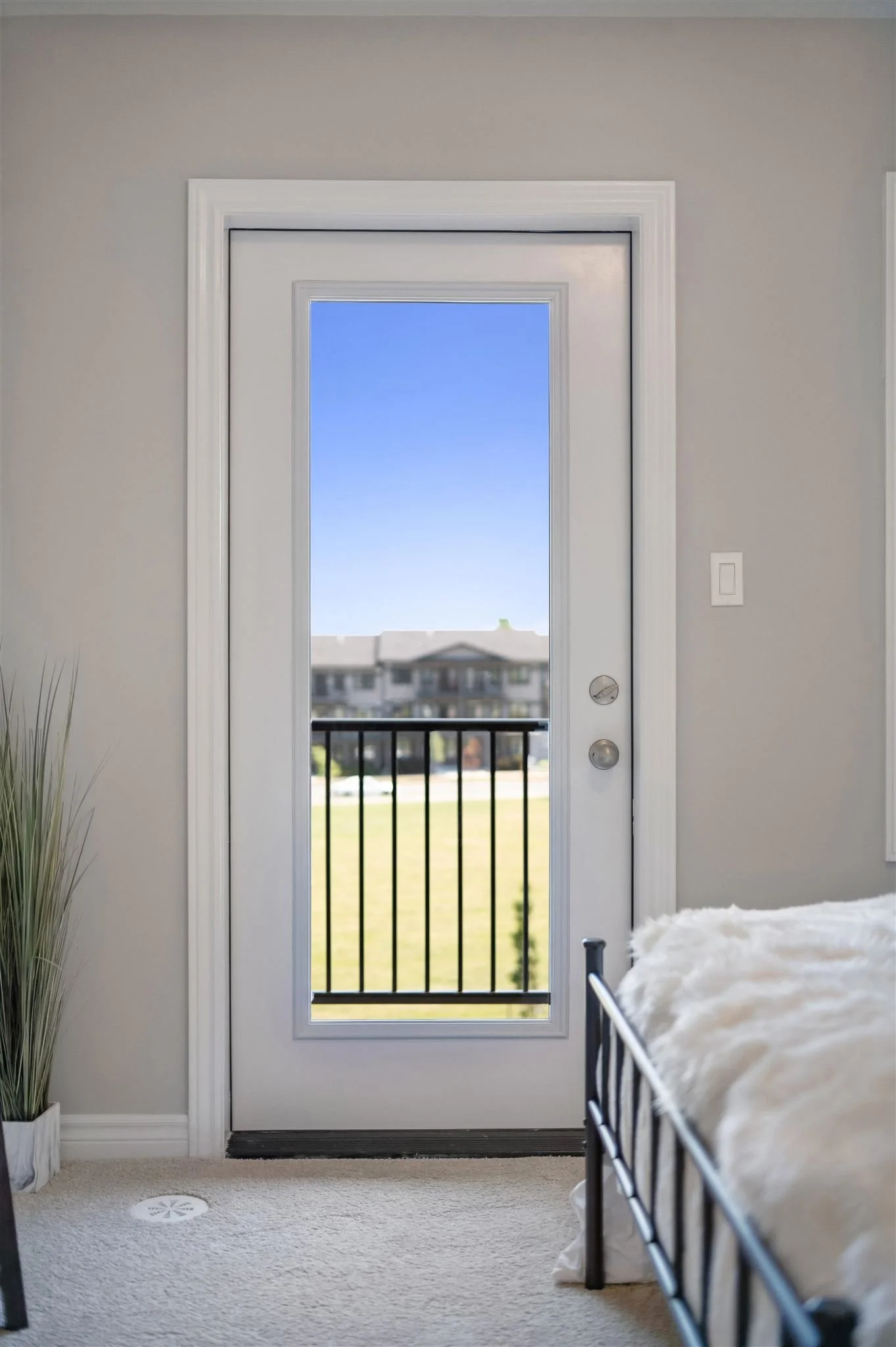 8 Oat Lane — Balcony walkout from primary bedroom