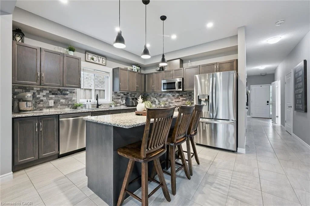 65 Miranda Path, Elmira — Kitchen with granite island