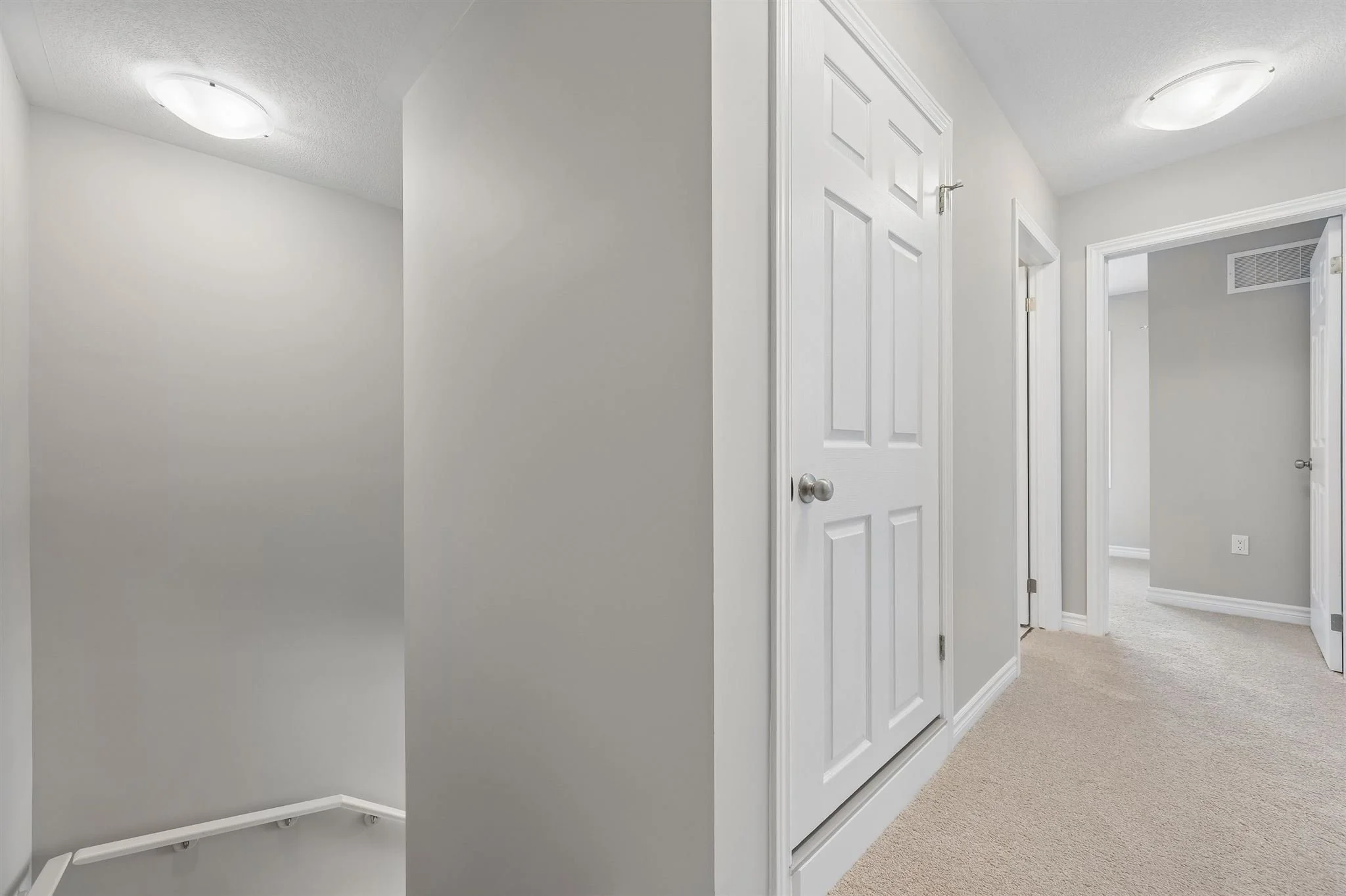 8 Oat Lane — Upper-level landing and hallway