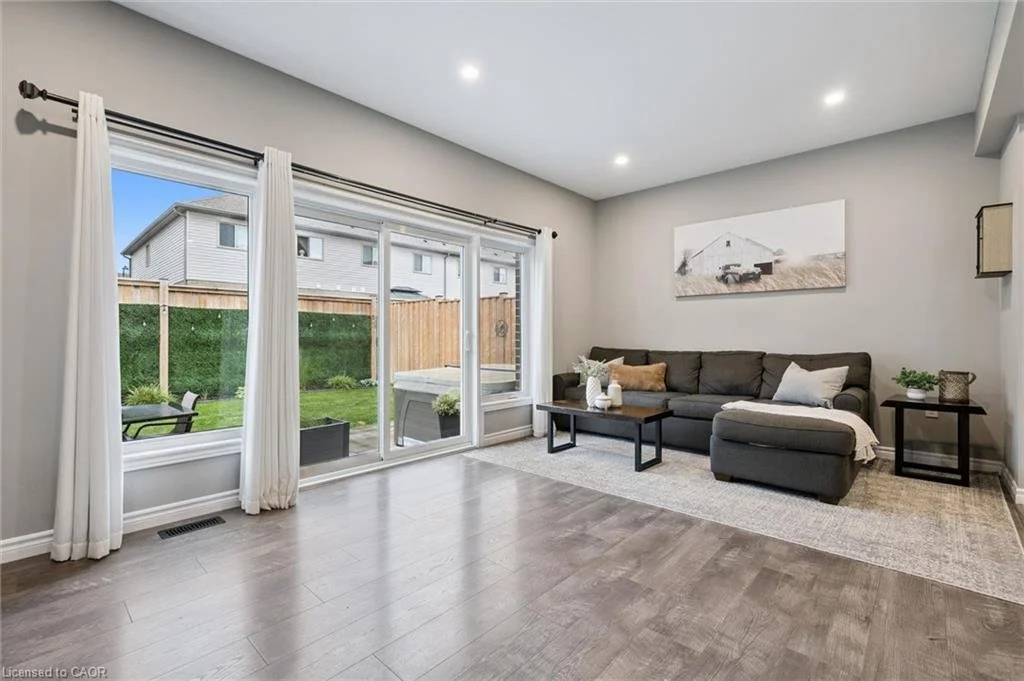 65 Miranda Path, Elmira — Living room with walkout to backyard