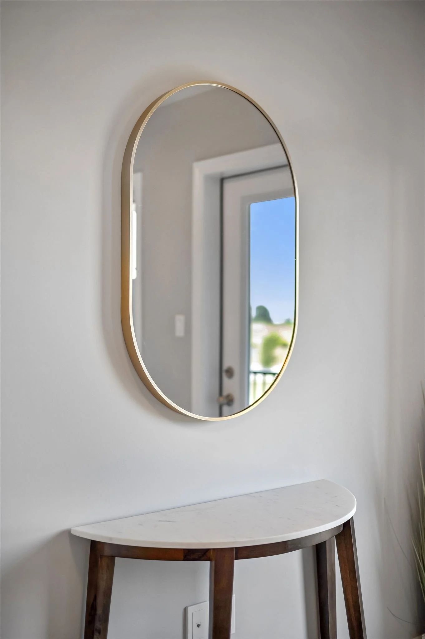 8 Oat Lane — Primary bedroom mirror and console detail
